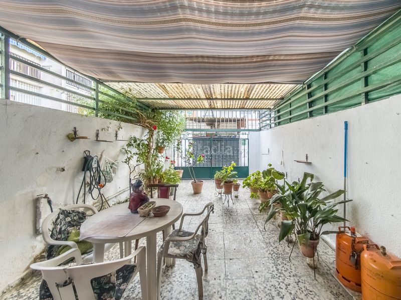 Foto cbb1db8c-da40-4f89-a1d0-f4979840f401. Casa aparellada a Entrevías Madrid