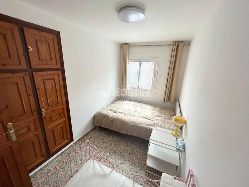 Foto 6c8716a1-b936-457d-a1d8-89582ac0c951. Casa aparellada amb aparcament a Centro ciudad Fuengirola