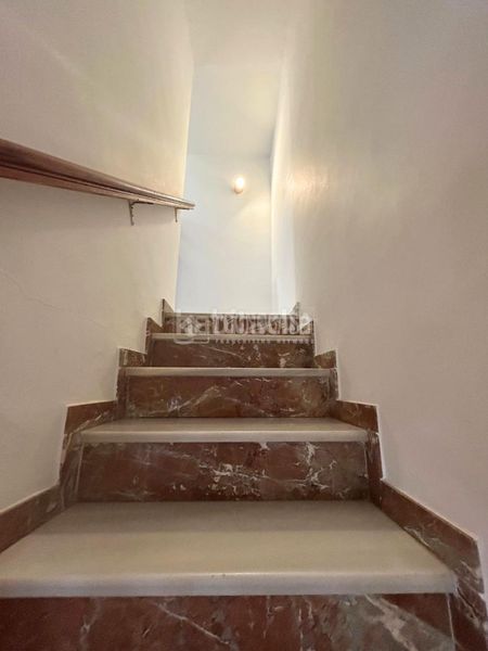 Foto ade69287-41f5-4b0e-a809-2b81e7d107ca. Casa aparellada amb aparcament a Centro ciudad Fuengirola