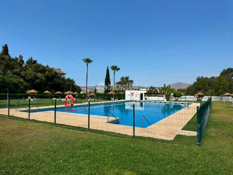 Foto 8a74a4c8-77f6-475d-8f1f-6a2bd7922f78. Casa aparellada amb aparcament piscina a Mijas golf Mijas
