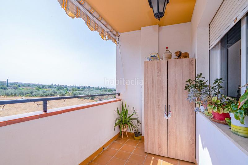 Foto 34dd0549-b560-422d-a5ae-cc6d9f027367. Piso en calle camino de los ogijares 1 piso en urbanización privada con piscina terraza y vistas despejadas en Zubia (La)