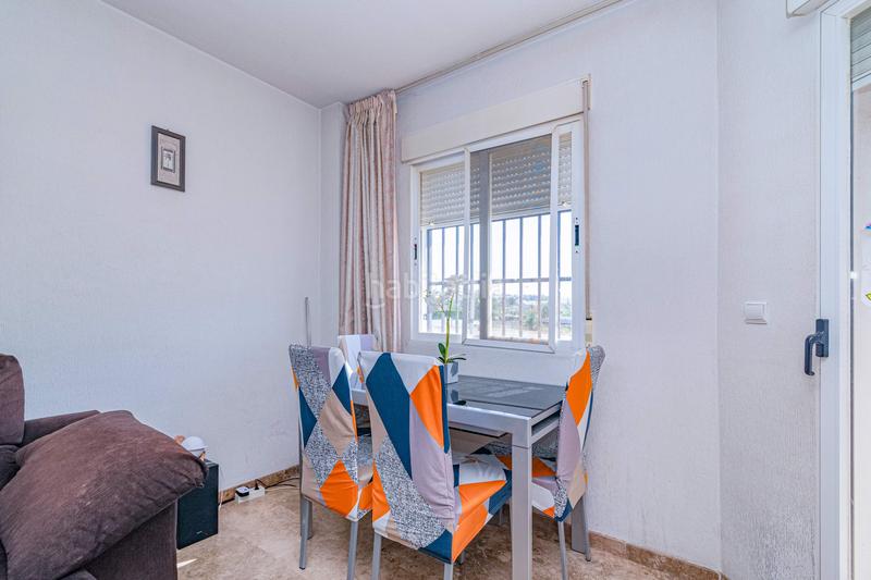 Foto fd8cad38-61bd-48b9-94fb-791f0c01e081. Piso en calle camino de los ogijares 1 piso en urbanización privada con piscina terraza y vistas despejadas en Zubia (La)