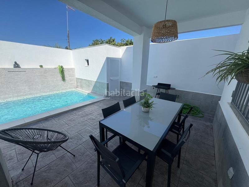 Foto 9205914c-2163-42d8-996d-d8cc6621c65e. Casa magnifica casa en planta baja con piscina privada junto a la zona de bajo de guía en Sanlúcar de Barrameda
