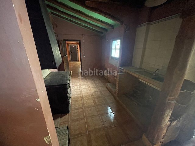 Foto 08d13ef7-bff1-45d6-9eb1-c7dc22fe15fc. Casa adossada amb aparcament a Belchite