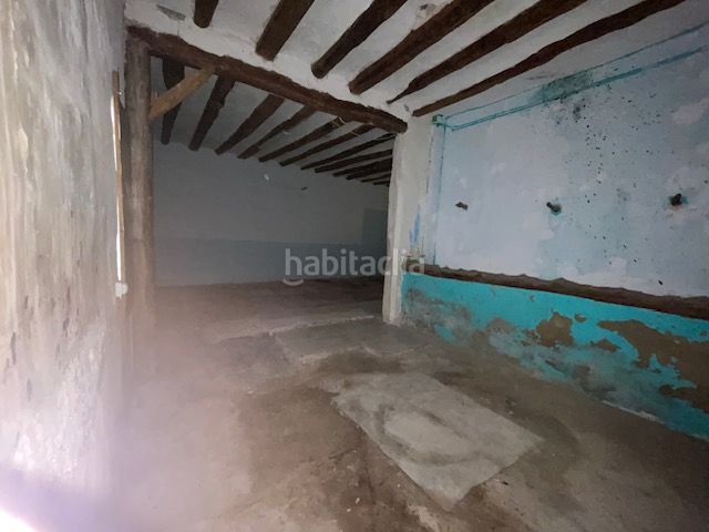 Foto 18c9f8a2-3edd-4976-967c-dbec8f98a102. Casa adossada amb aparcament a Belchite