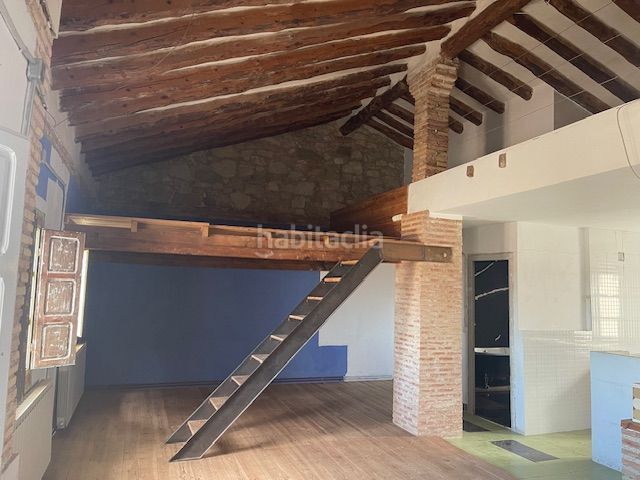 Foto bad65b29-9d7a-4252-8991-eab1f985cf08. Casa adossada amb aparcament a Belchite