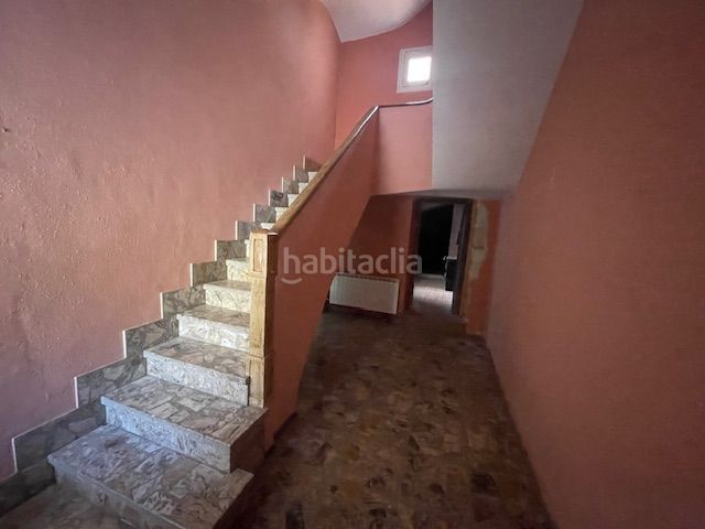 Foto fad2e7b4-e794-4b64-8b12-cce769085b74. Casa adossada amb aparcament a Belchite