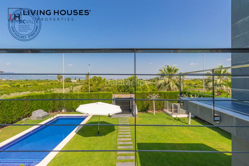 Foto bb7ad7be-61ce-478f-8751-dc378922b34c. Casa con riscaldamento parcheggio piscina in Playa Burriana