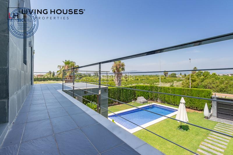 Foto fff3198e-c49b-463e-ba6a-c15f7dae44a0. Casa con riscaldamento parcheggio piscina in Playa Burriana