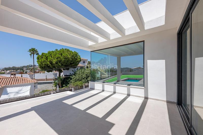 Foto 12e2337d-efcf-4644-9b0f-e810624b7b21. Casa amb calefacció aparcament piscina a Las Flores Mijas