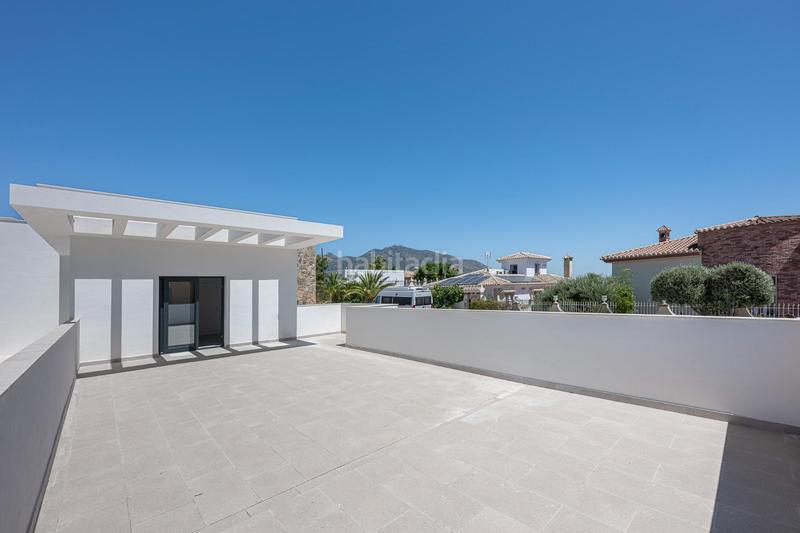 Foto 532c493c-413e-4d22-a267-9fa636112de0. Casa amb calefacció aparcament piscina a Las Flores Mijas