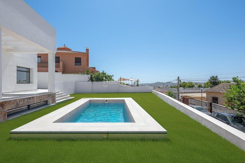 Foto 653d9a0f-cd8b-4378-ae62-1c6070e4b615. Casa amb calefacció aparcament piscina a Las Flores Mijas