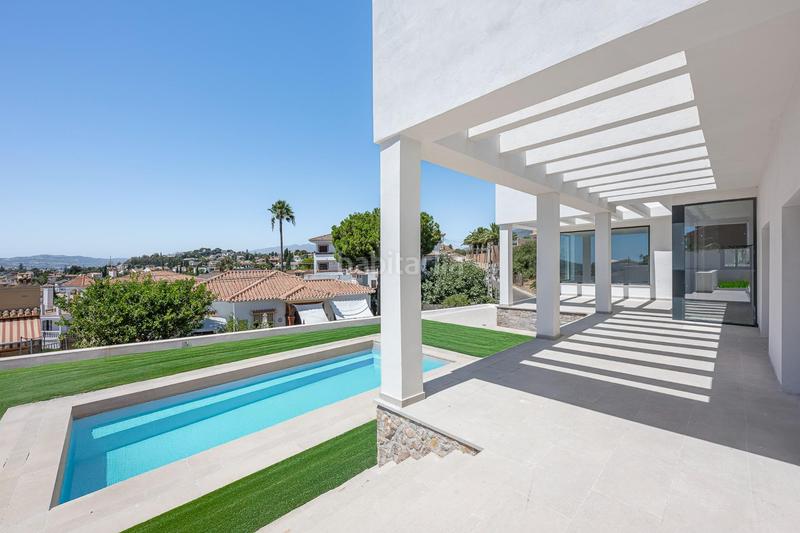 Foto 91c08346-4b79-41e8-92f3-c45f77efe683. Casa amb calefacció aparcament piscina a Las Flores Mijas