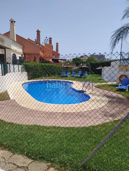 Foto f4baeec4-9af6-4a9d-a791-48bef7dfc0ea. Location maison jumelée avec parking piscine dans Los Pacos Fuengirola