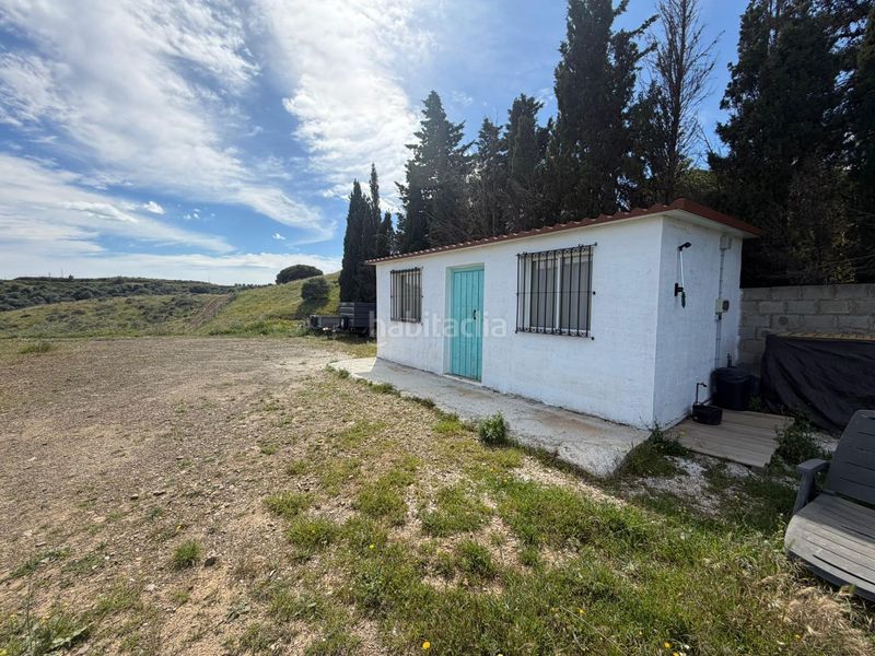 Foto 12032c64-789d-40f1-b219-6909a818717a. Finca rústica en Mijas 6 parcela rústica con casa de aperos, a tan solo minutos del centro de la ciudad y de la playa. con amplias vistas al mar y la monta en Mijas