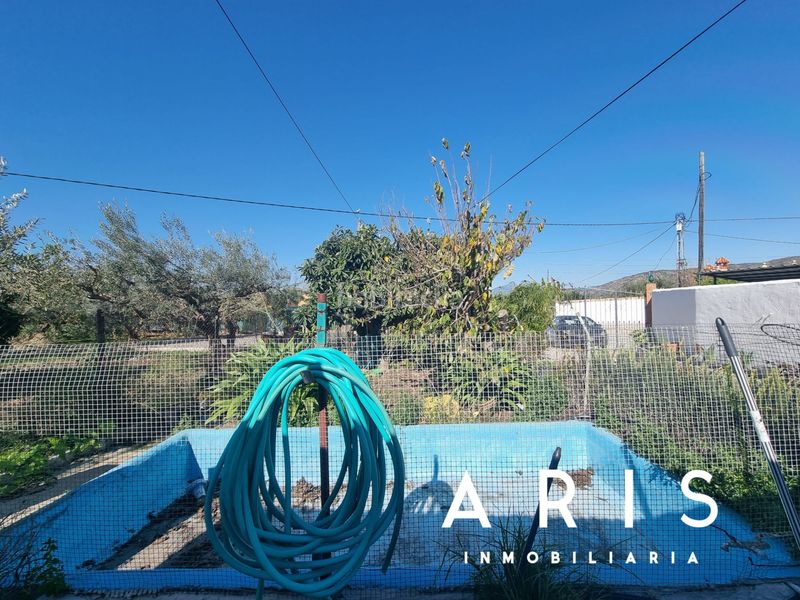 Foto e485b680-351d-4270-a31b-f70e39cca7c6. Casa amb aparcament a Alquería-Torrealquería Alhaurín de la Torre