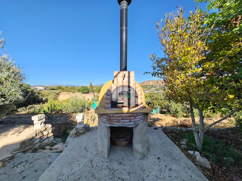 Foto 0ad65eff-a703-4194-9ba8-8dc9df41d052. Bauernhof mit kamin parking in Alquería-Torrealquería Alhaurín de la Torre