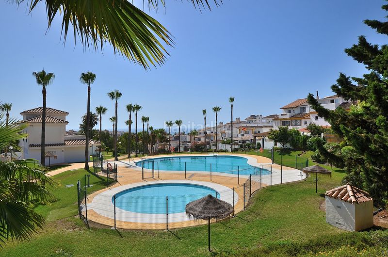 Foto b58d8fc6-36fe-4ee1-b8ae-1bd167a71f87. Casa adossada amb aparcament piscina a Arroyo de la Miel Benalmádena