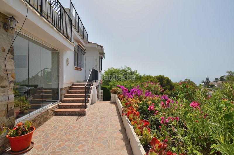 Foto feb1d6b7-7498-48a5-98a5-bbd0ea96fd5d. Casa amb xemeneia piscina a Torremuelle Benalmádena
