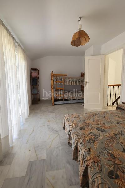 Foto 04e966f5-cf1c-46b2-9d67-61b64ab32c16. Casa adosada tu espacio soñado con potencial en Los Boliches en Fuengirola