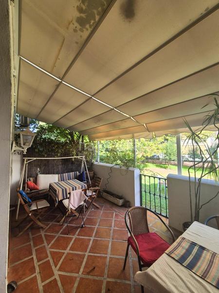 Foto 42deb560-b62f-4a90-bdf5-0da76ce1e378. Casa adosada tu espacio soñado con potencial en Los Boliches en Fuengirola