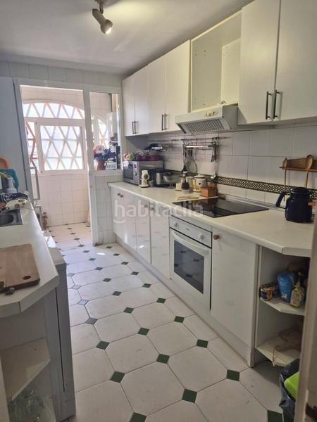 Foto c42c1e1c-3274-4b1e-a648-5f757a913f4e. Casa adosada tu espacio soñado con potencial en Los Boliches en Fuengirola