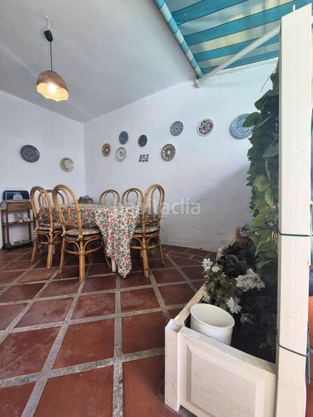 Foto d4a3bbc0-faa2-4a94-bf44-187ab725c40d. Casa adosada tu espacio soñado con potencial en Los Boliches en Fuengirola