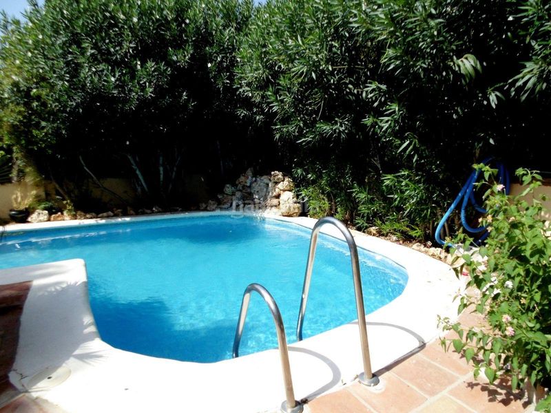 Foto a072087b-f689-4ff1-8a2b-e9bedcb1f6a4. Casa aparellada amb aparcament piscina a campo de Mijas Mijas