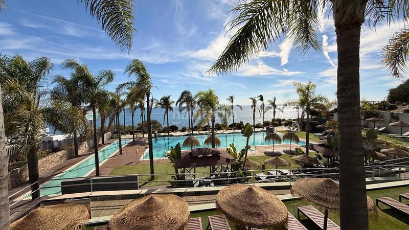 Foto f253a715-4c82-4ae3-a1d6-01a4cc1a4b1f. Apartamento  con terraza y espectaculares vistas al mar costa en Mijas