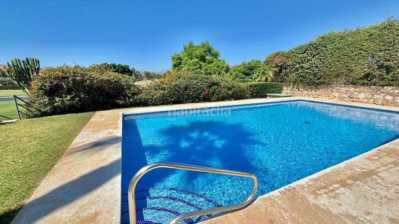 Foto 3c758ad8-f3e2-4570-9b57-e84b91c1eff9. Casa adossada amb calefacció aparcament piscina a Mijas