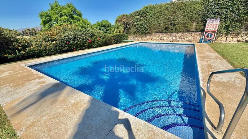 Foto 7f8bb136-ec61-4f41-bb61-046935b1b8d8. Casa adossada amb calefacció aparcament piscina a Mijas