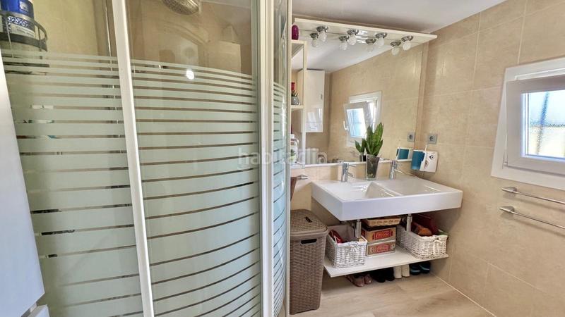 Foto f453f70f-1340-4d24-8bbf-4c3d41ceebfc. Casa adossada amb calefacció aparcament piscina a Mijas