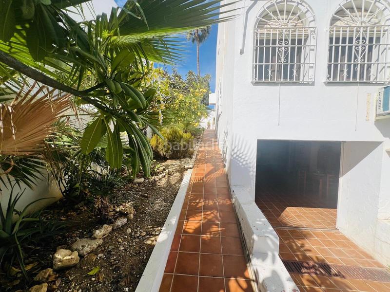 Foto 1d5e7155-1160-492d-a489-4d48299ea6be. Casa aparellada amb calefacció aparcament a La Colina Torremolinos