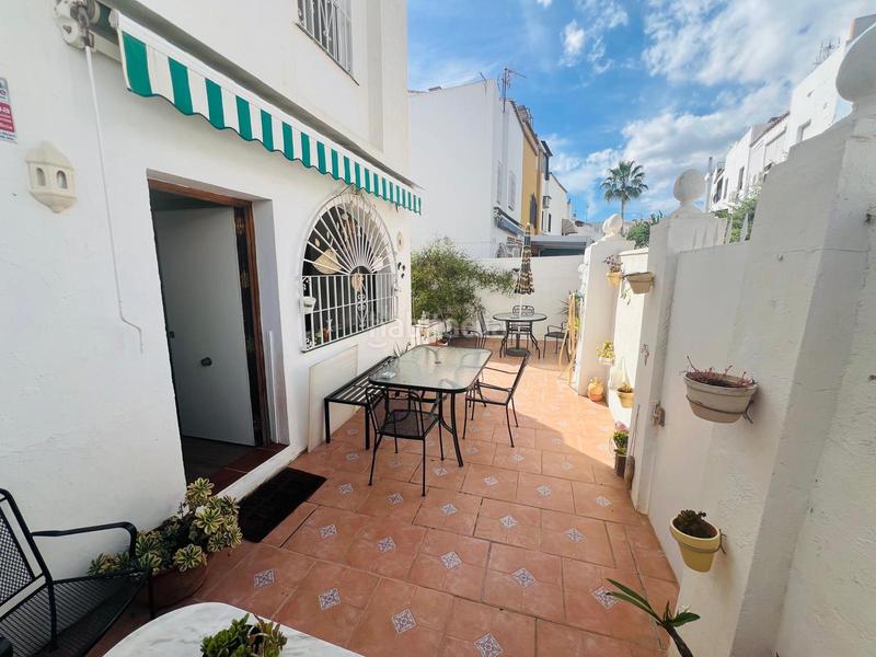 Foto 5c41bb68-2b8a-4803-86fc-4f08468c90c5. Casa aparellada amb calefacció aparcament a La Colina Torremolinos