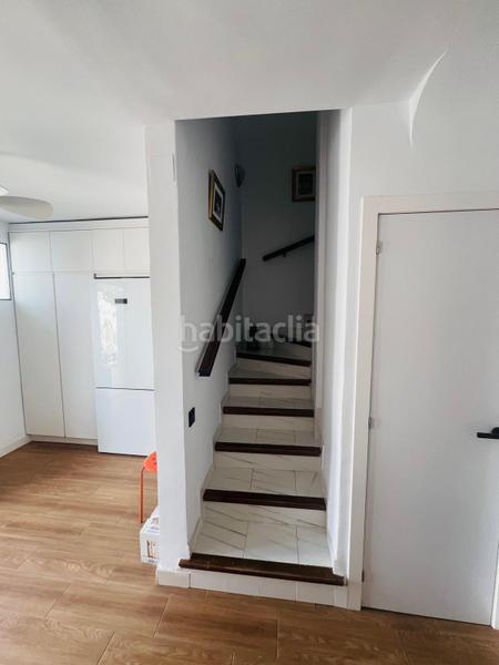 Foto baddab3b-7200-49d7-aff5-2d7e7d90278a. Casa aparellada amb calefacció aparcament a La Colina Torremolinos