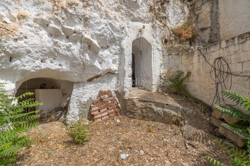 Foto d42f78c9-ca49-490c-a587-b98563323832. Masía oportunidad casa cueva con patio y opción de edificar en Monachil