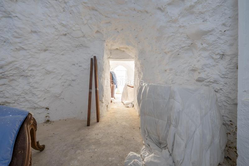 Foto ea24d0e6-9606-4c66-8c7b-8776f6ded089. Masía oportunidad casa cueva con patio y opción de edificar en Monachil
