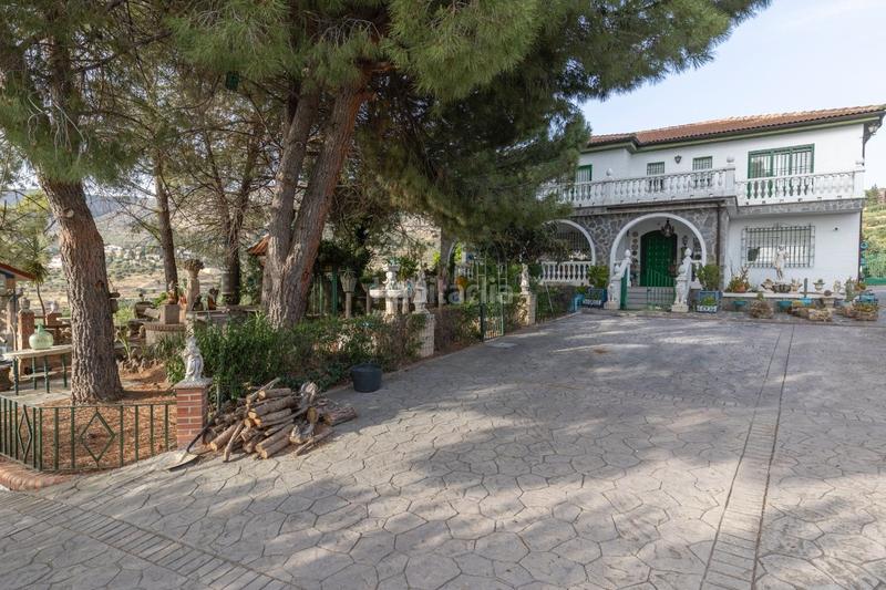 Foto 3fb9affc-5b88-40ee-b46d-7aa7c52b3330. Casa se vende exclusiva vivienda en alfacar cuesta con extension de terreno rústico de 6.000m2 en Víznar