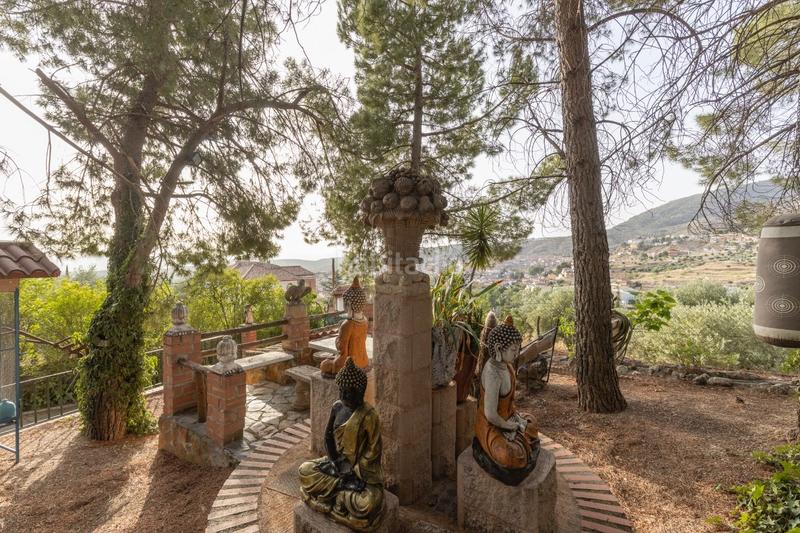 Foto a25d94fd-688f-48b2-a016-f2ceafd865ae. Casa se vende exclusiva vivienda en alfacar cuesta con extension de terreno rústico de 6.000m2 en Víznar