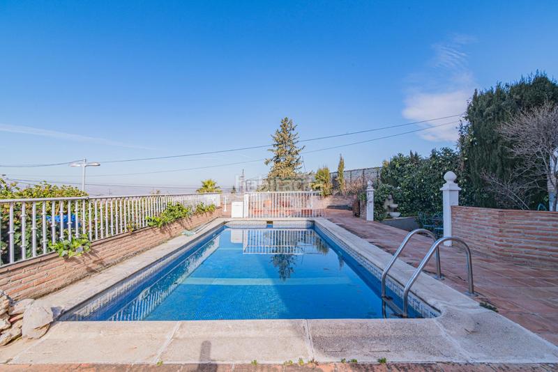 Foto 45ef30eb-e3e8-48df-a984-247098fbe359. Chalet con riscaldamento parcheggio piscina in Barrio de la Vega Monachil