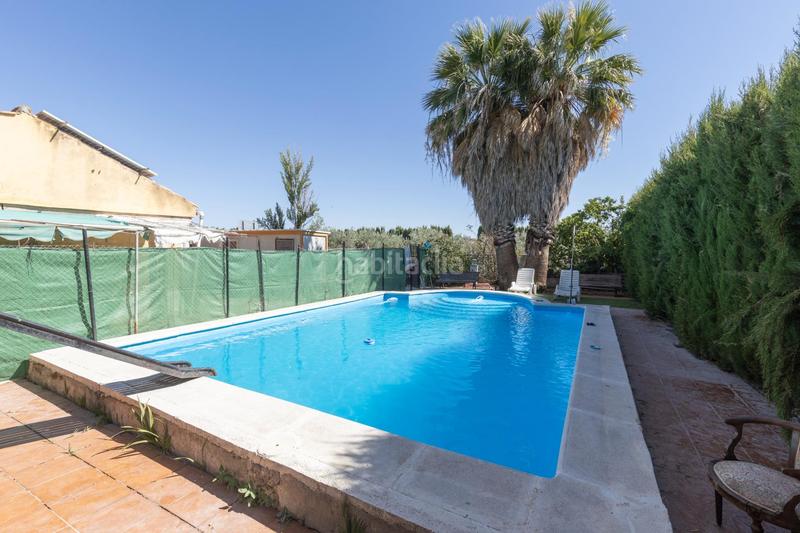 Foto e2cb2c29-699b-4ec0-ba82-90104109be5c. Masia a calle diseminados a Santa Fe