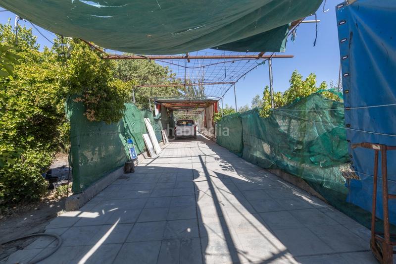 Foto e71dc114-c4e2-42a7-aae4-6d00dfe02f1c. Masia a calle diseminados a Santa Fe