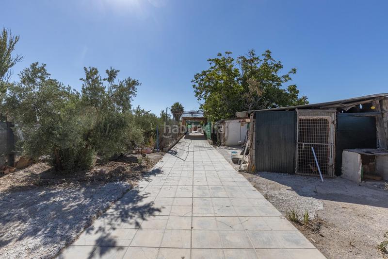 Foto eae8177e-3011-41e5-846a-40673411bc0a. Masia a calle diseminados a Santa Fe