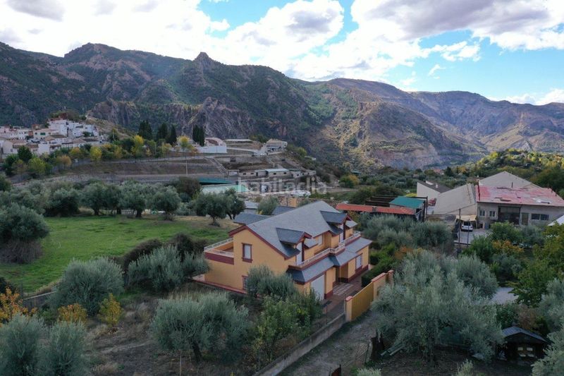 Foto 442a790b-4ce7-4a5b-98cd-d1bfec7db591. Xalet amb aparcament piscina a Güéjar Sierra