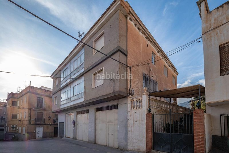 Foto 97fb6fea-a412-462b-bbc2-69ae97bac56f. Piso en calle calle lora tamayo 11-13 tres amplios pisos,local comercial , garajes y gran solar, en en centro de orgiva en Órgiva
