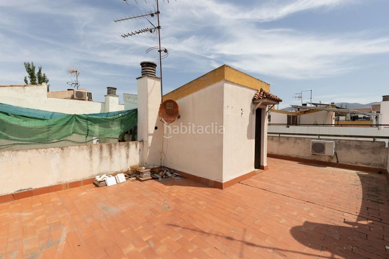 Foto 316e97af-d557-4697-b040-0b61014bf383. Casa adossada amb calefacció aparcament a Maracena