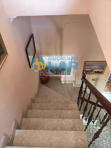 Foto f9f23bd2-8c33-499a-9aa2-c8a389c0ec3e. Casa a Rociana del Condado