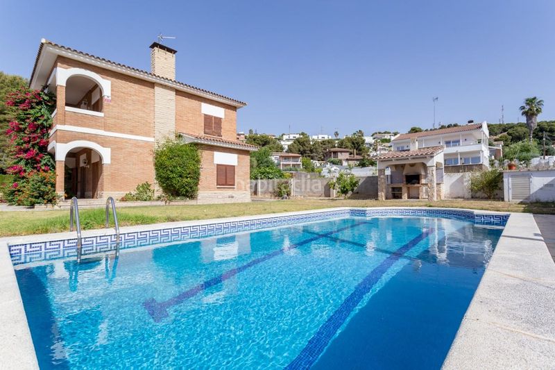 Foto 597425d4-8f4b-44f3-8bfb-c99856a93fe4. Casa con parcheggio piscina in Els Masos - Els Garrofers Coma-ruga