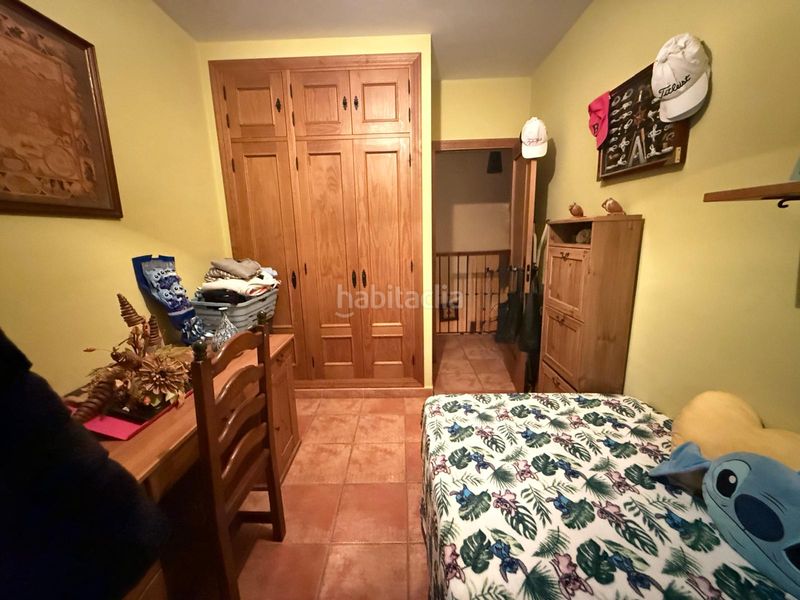 Foto dc6cb805-0685-49ad-9b8d-923d8c4ccd03. Casa a schiera con camino parcheggio in San Roque pueblo San Roque