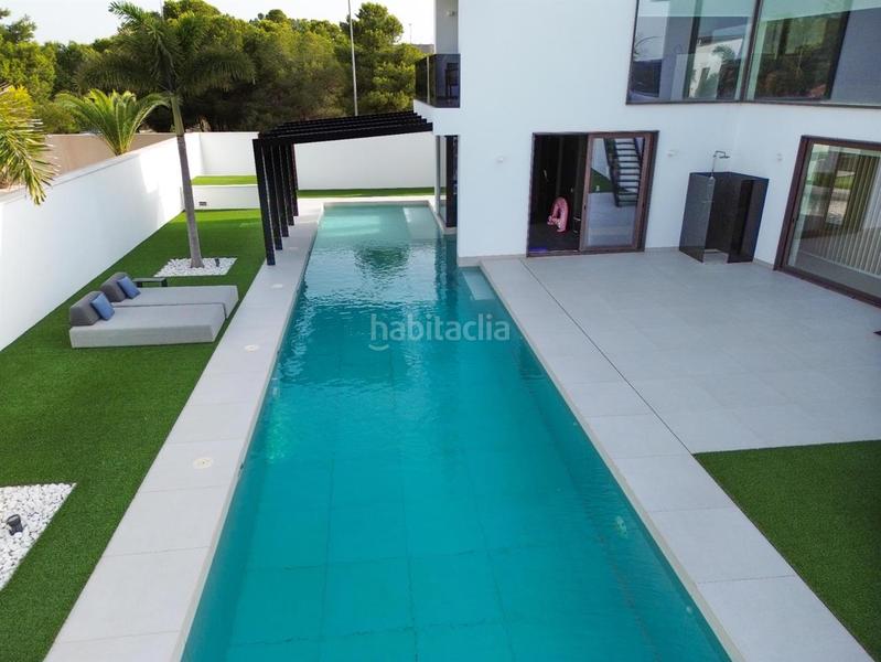 Foto 2a700882-a89b-475b-9bfd-7f26fa544d79. Chalet avec parking piscine dans puerto Vera Vera